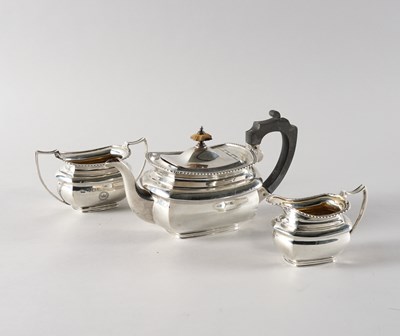Lot 202 - A SILVER THREE PIECE TEA SET