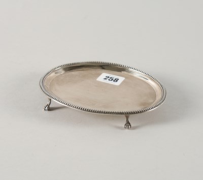 Lot 258 - A GEORGE III SILVER TEAPOT STAND
