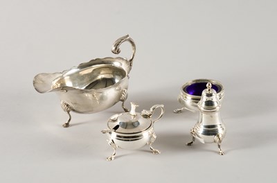 Lot 282 - A SILVER SAUCEBOAT AND A CONDIMENT SET (5)