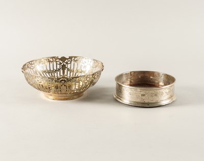 Lot 308 - A SILVER BOWL AND A SILVER MOUNTED BOTTLE COASTER (2)