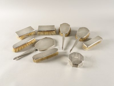 Lot 317 - A GROUP OF SILVER MOUNTED DRESSING TABLE WARES (9)