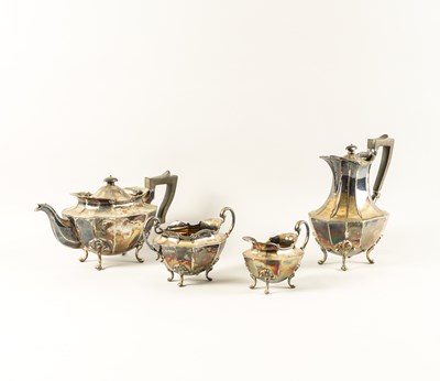 Lot 330 - A SILVER THREE PIECE TEA SET AND A SIMILAR HOT WATER JUG (4)