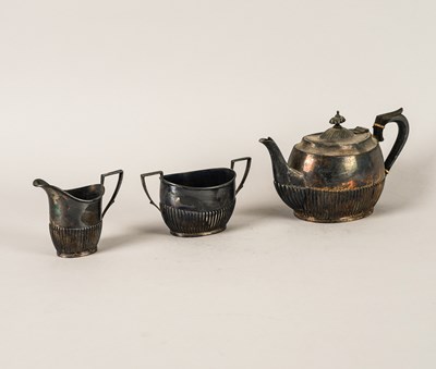 Lot 334 - A SILVER THREE PIECE TEA SET