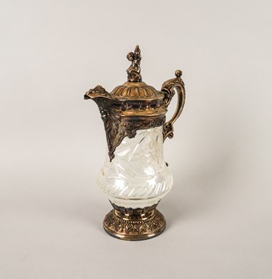 Lot 344 - A PORTUGUESE SILVER PLATED METAL MOUNTED FACETED GLASS WINE EWER