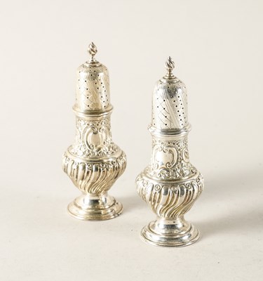 Lot 349 - A PAIR OF VICTORIAN SILVER LARGE PEPPER CASTERS