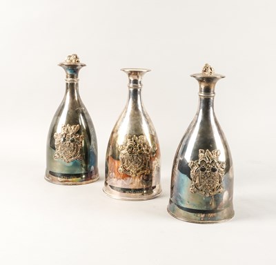 Lot 381 - A SET OF THREE SILVER DECANTERS
