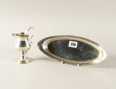 Lot 390 - A GEORGE III SILVER OVAL SNUFFER'S TRAY AND A SILVER CREAM JUG (2)