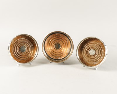 Lot 411 - A SILVER MOUNTED BOTTLE COASTER AND A PAIR OF SILVER MOUNTED BOTTLE COASTERS (3)