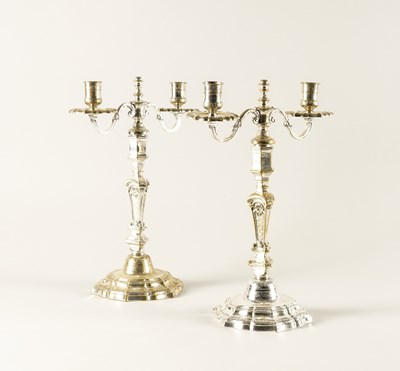 Lot 414 - A PAIR OF PLATED TWIN LIGHT TABLE CANDELABRA (2)