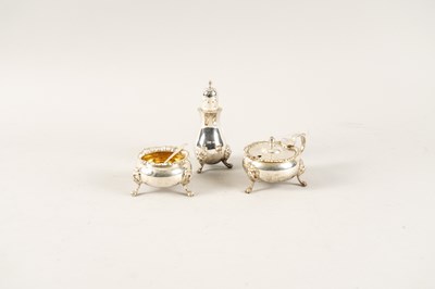 Lot 421 - A GROUP OF THREE SILVER CONDIMENTS AND TWO SPOONS (5)