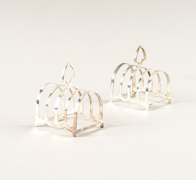 Lot 423 - A PAIR OF SILVER FIVE BAR TOASTRACKS