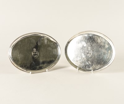 Lot 430 - A PAIR OF GEORGE III SILVER OVAL CARD TRAYS (2)
