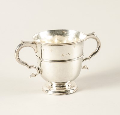 Lot 440 - A GEORGE I BRITANNIA STANDARD SILVER TWIN HANDLED CUP