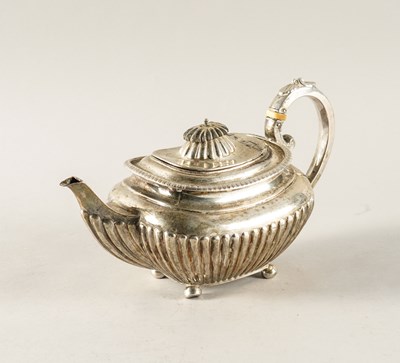 Lot 443 - A SILVER TEAPOT