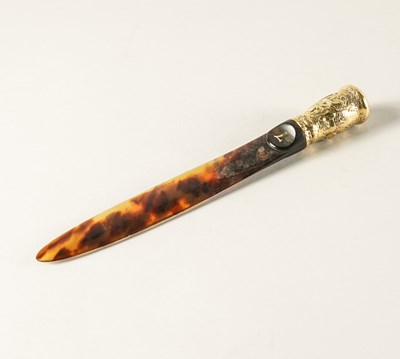 Lot 450 - A GOLD HANDLED TORTOISESHELL BLADED PAPER KNIFE