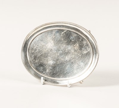 Lot 470 - A GEORGE III SILVER OVAL TEAPOT STAND