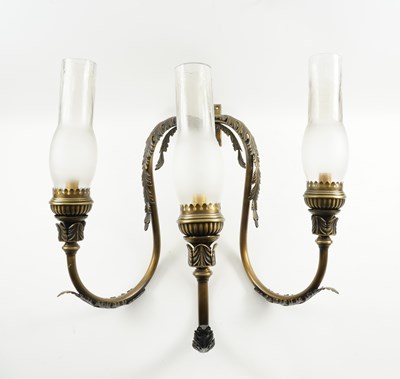 Lot 551 - A SET OF TEN PATINATED GILT-BRASS THREE LIGHT WALL LIGHTS (10)