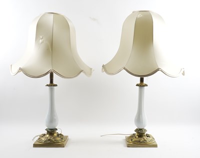 Lot 559 - A PAIR OF LATE VICTORIAN WHITE OPALINE GLASS AND BRASS MOUNTED TABLE LAMPS (3)