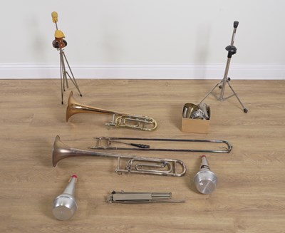 Lot 570 - TWO CASED TROMBONES AND A COLLECTION OF ACCESSORIES INCLUDING MOUTHPIECES AND MUTES (QTY)