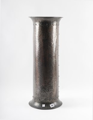 Lot 579 - W.A.S BENSON: AN ARTS & CRAFTS SPOT HAMMERED COPPER CYLINDRICAL WALKING STICK STAND