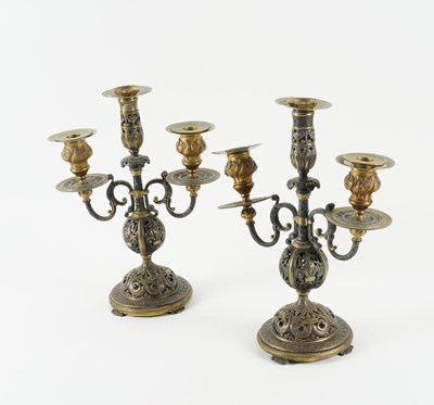 Lot 588 - A PAIR OF SILVERED AND PARCEL GILT THREE  LIGHT CANDELABRA (2)