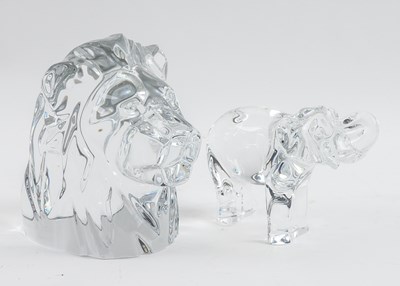 Lot 604 - BACCARAT: A GLASS LION’S HEAD PAPERWEIGHT AND AN ELEPHANT (2)