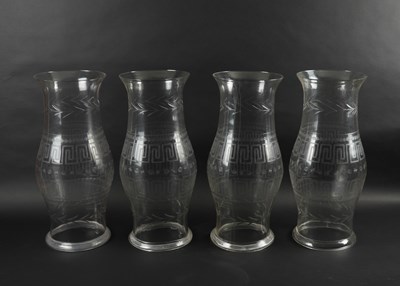 Lot 627 - A SET OF FOUR GLASS STORM SHADES (4)