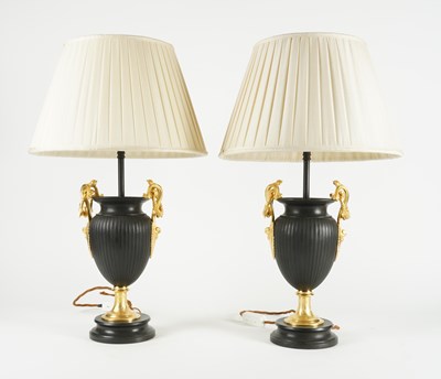 Lot 633 - A PAIR OF BLACK AND GILT METAL OVOID TABLE LAMPS (2)