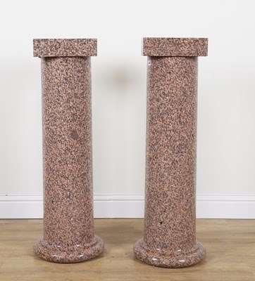 Lot 638 - A PAIR OF POLISHED PINK GRANITE PEDESTAL COLUMNS (2)