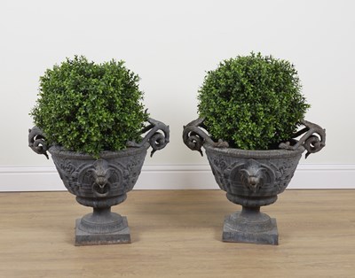 Lot 639 - A PAIR OF PATINATED GARDEN URNS WITH LION MASK HANDLES (2)