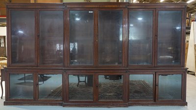 Lot 737 - A LARGE 19TH CENTURY MAHOGANY BREAKFRONT BOOKCASE CABINET