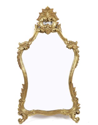 Lot 764 - AN 18TH CENTURY STYLE SHAPED GILT FRAMED MIRROR