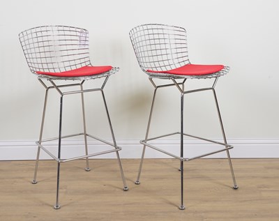 Lot 766 - HARRY BERTOIA FOR KNOLL; A PAIR OF CHROME-PLATED STEEL BAR STOOLS (2)