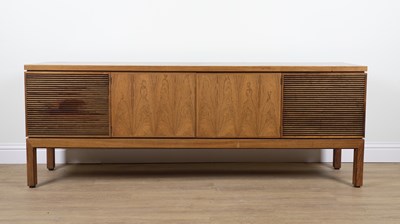 Lot 770 - PROBABLY ARCHIE SHINE FOR HEALS FURNITURE; A MID 20TH CENTURY ROSEWOOD FOUR DOOR SIDEBOARD