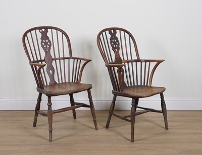 Lot 779 - A PAIR OF ASH AND ELM WHEELBACK WINDSOR CHAIRS (2)