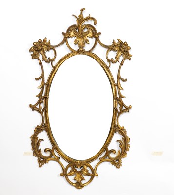 Lot 784 - A GEORGE III STYLE GILT FRAMED OVAL WALL MIRROR