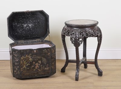 Lot 811 - A CHINESE CARVED HARDWOOD CIRCULAR JARDINIERE STAND (2)
