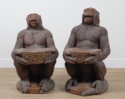 Lot 815 - W. WINTEN BALI; TWO PARCEL GILT HARDWOOD SEATS, RELIEF CARVED AS MONKEYS HOLDING A DRUM (2)