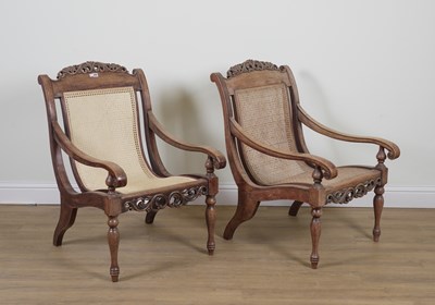 Lot 820 - A PAIR OF 19TH CENTURY ANGLO-INDIAN HARDWOOD PLANTATION STYLE OPEN ARMCHAIRS (2)