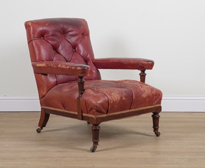 Lot 825 - GILLOWS; A 19TH CENTURY BUTTON ROUGE LEATHER UPHOLSTERED OPEN ARMCHAIR