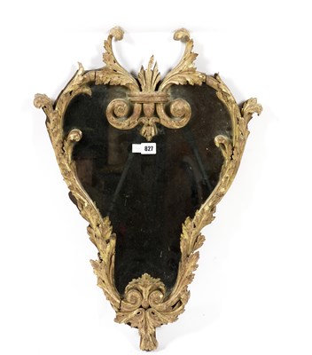 Lot 827 - AN 18TH CENTURY GILT FRAMED SHAPED WALL MIRROR