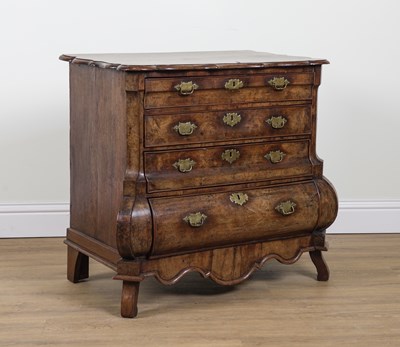 Lot 830 - AN EARLY 19TH CENTURY DUTCH WALNUT BOMBE FOUR DRAWER COMMODE