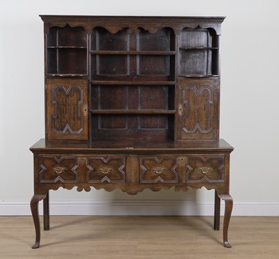 Lot 833 - A CHARLES II STYLE OAK THREE DRAWER DRESSER