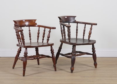 Lot 863 - A NEAR PAIR OF ELM SEATED SMOKER'S BOW ARMCHAIRS (2)