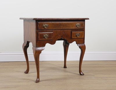 Lot 864 - A GEORGE II INLAID FIGURED WALNUT THREE DRAWER LOW BOY