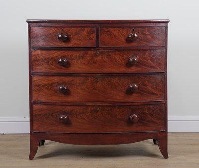 Lot 874 - A LATE REGENCY MAHOGANY BOWFRONT FIVE DRAWER CHEST