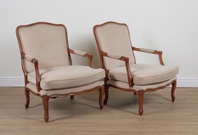 Lot 879 - A PAIR OF MODERN FRENCH STAINED BEECH OPEN ARMCHAIRS (2)