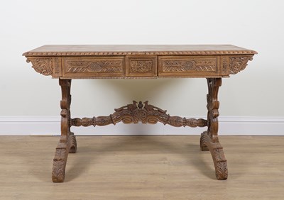Lot 893 - A 19TH CENTURY ANGLO-INDIAN CARVED HARDWOOD RECTANGULAR TWO DRAWER CENTRE TABLE