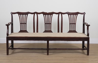 Lot 903 - A GEORGE III OAK FRAMED TRIPLE CHAIR BACK OPEN ARM SOFA