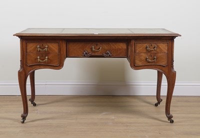 Lot 926 - A LOUIS XV STYLE WALNUT FIVE DRAWER WRITING TABLE